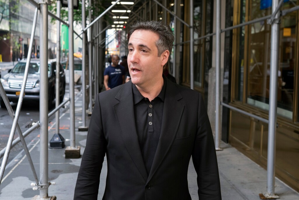 (Jonathan Carroll | AP file photo) President Donald Trump's former personal attorney, stops to talk to a member of the media in New York earlier in May 2019. The House intelligence committee has released two transcripts of closed-door interviews with Cohen, along with some exhibits from the testimony. The vote to release the transcript came two weeks after Cohen reported to federal prison for a three-year sentence.