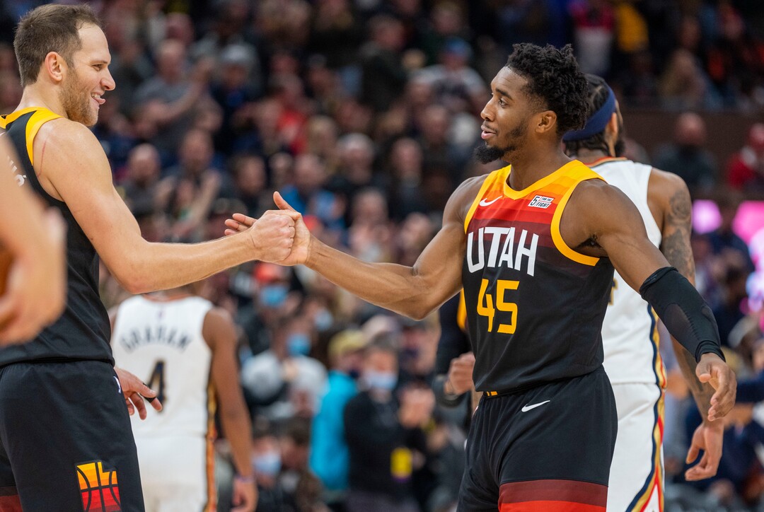 (Rick Egan | The Salt Lake Tribune) Utah Jazz forward Bojan Bogdanovic (44) shakes the hand of Donovan Mitchell (45) as it appeared that he put the Jazz up 94-93 with 1:40 left, in NBA action between the Utah Jazz and the New Orleans Pelicans, at Vivint Arena, in Salt Lake City, on Friday, Nov. 26, 2021.