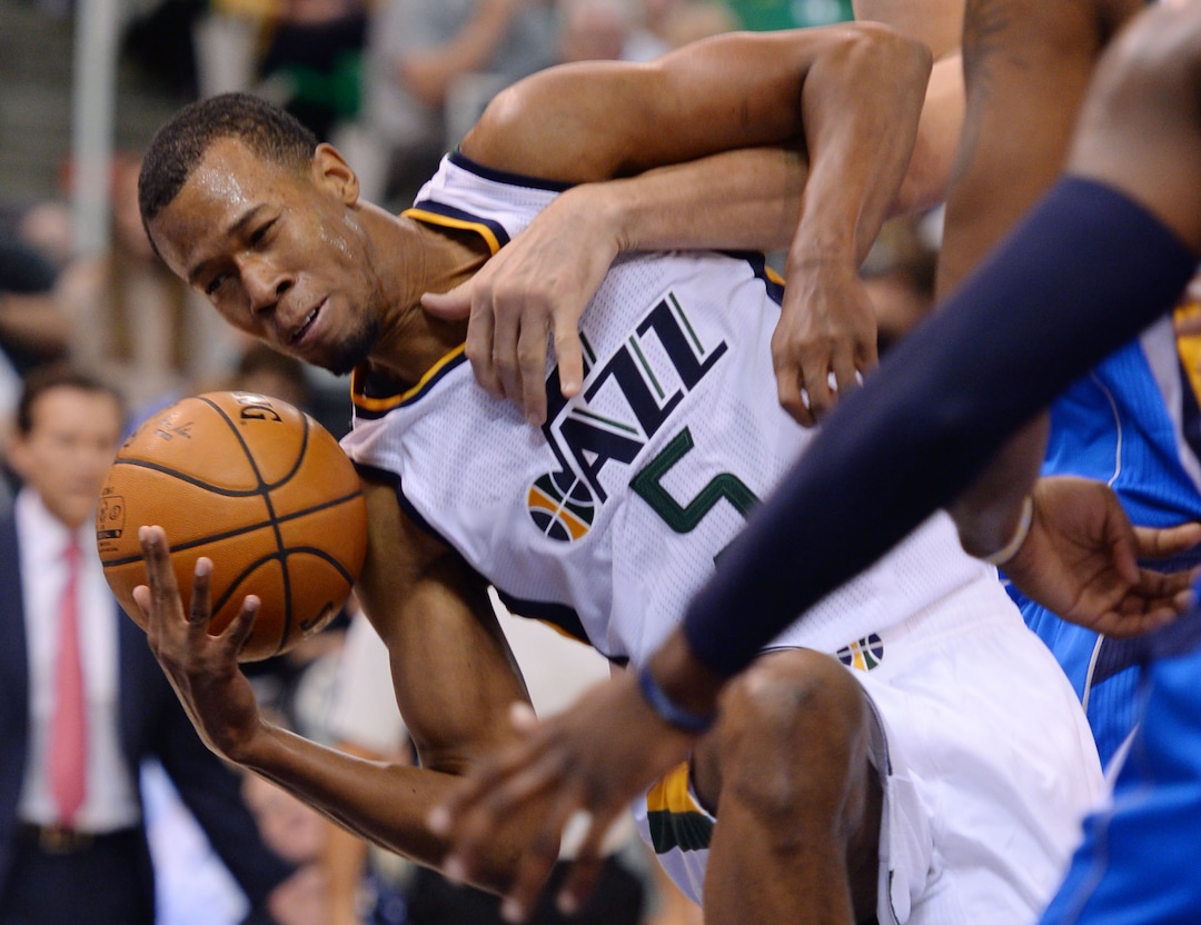 Steve Griffin / The Salt Lake TribuneUtah Jazz guard Rodney Hood (5)hangs onto the ball as he tries to get to the basket during NBA game against there Dallas Mavericks at Vivint Smarthome Arena in Salt Lake City Wednesday November 2, 2016. 