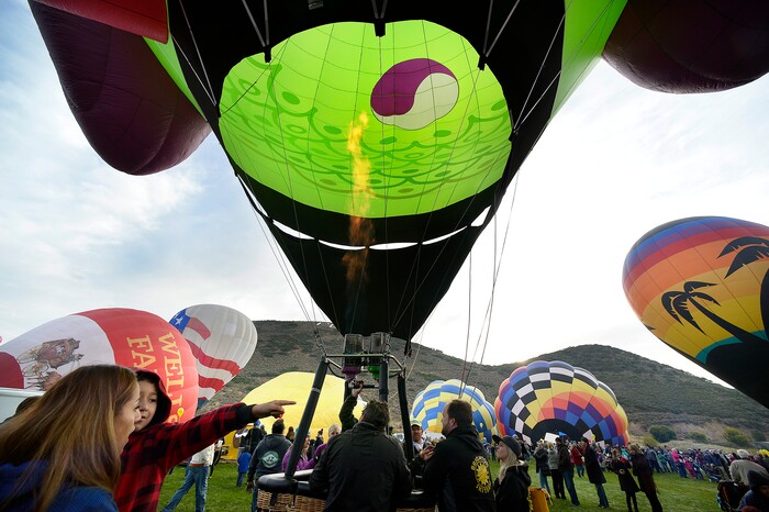 (Scott Sommerdorf | The Salt Lake Tribune)
The "Whoo'z Up" Owl balloon is up and being inflated prior to the launch at the 4th annual Autumn Aloft Hot Air Balloon Festival in Park City, Sunday, September 17, 2017.