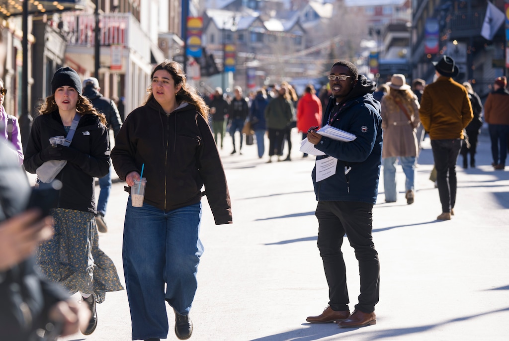 (Bethany Baker | The Salt Lake Tribune) A paid signature gatherer in Park City on Saturday, Jan. 24, 2026. Incidents elsewhere in the state between gatherers and opponents have led Gov. Spencer Cox to call for respect between the two sides.