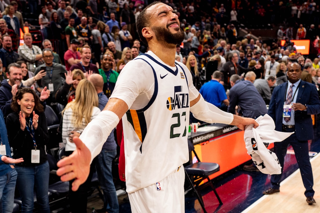 (Trent Nelson  |  The Salt Lake Tribune) Utah Jazz center Rudy Gobert (27) is doused by Utah Jazz guard Donovan Mitchell (45) as the Utah Jazz host the Dallas Mavericks, NBA basketball in Salt Lake City on Saturday, Jan. 25, 2020.