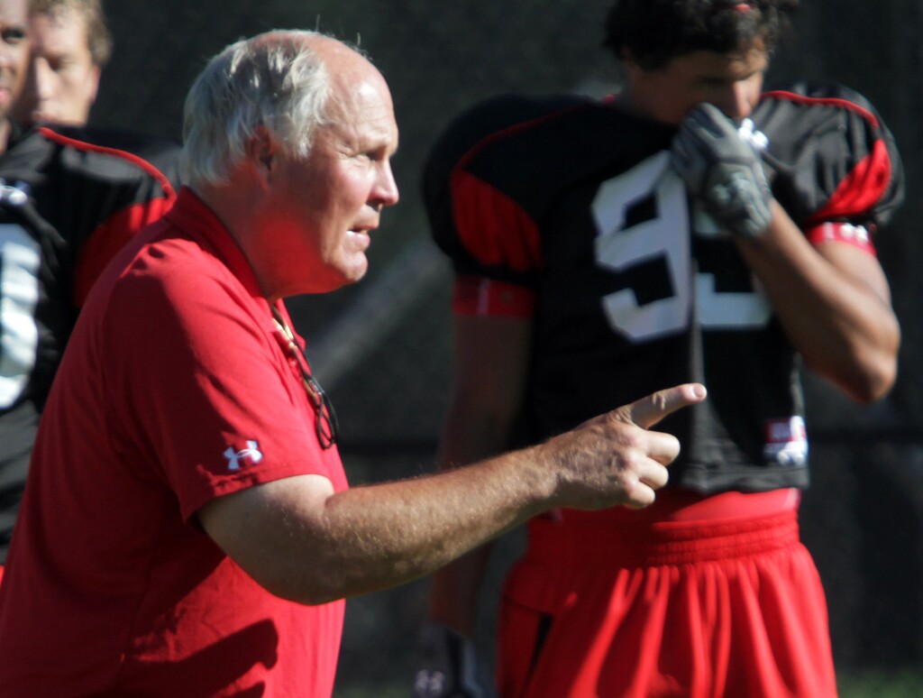 (Rick Egan | The Salt Lake Tribune) John Pease, the Utes' defensive line coach, gives directions during practice, Monday, Aug. 16, 2010.