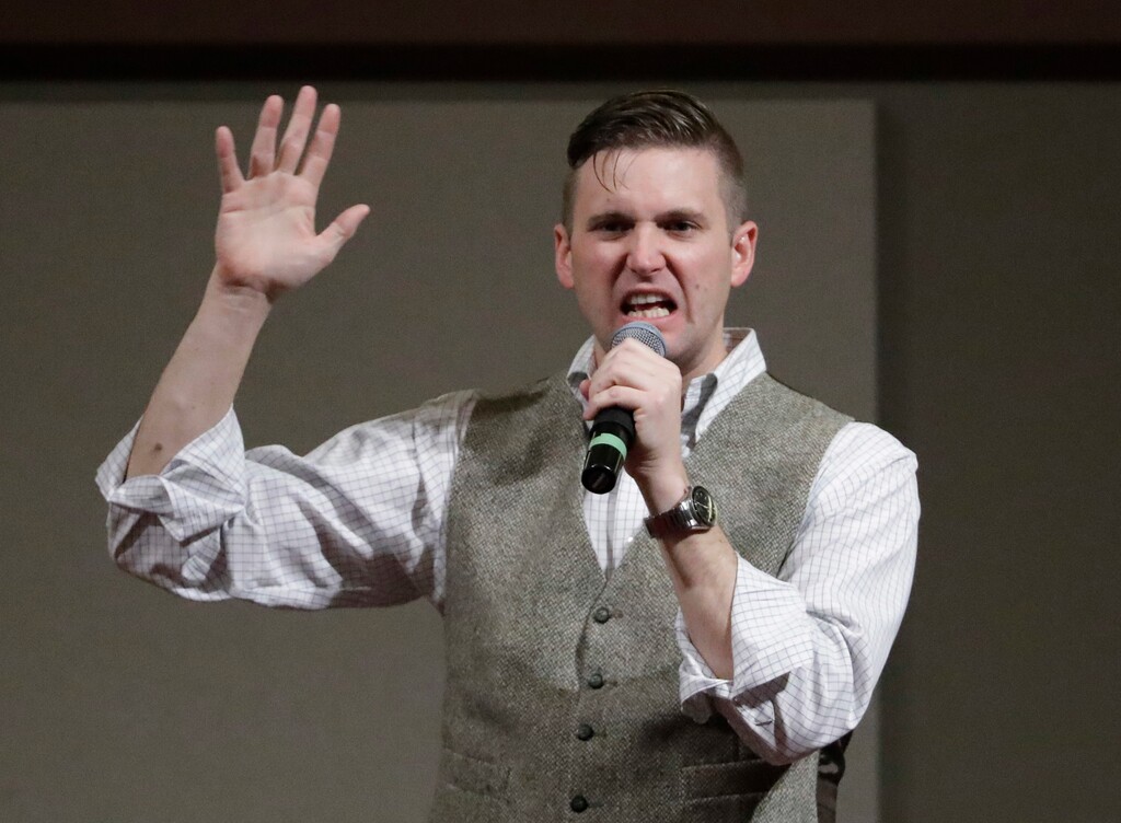 FILE - In this Dec. 6, 2016 file photo, Richard Spencer, who leads a movement that mixes racism, white nationalism and populism, speaks at the Texas A&M University campus in College Station, Texas. The Montana ski resort town of Whitefish is an unlikely flashpoint between white supremacists and residents trying to preserve the small town's reputation as a welcoming vacation destination. But that's just what happened after the mother of Spencer, a so-called "alt-right" movement leader, said last week she was being pressured to sell her property and denounce her son's views. (AP Photo/David J. Phillip, File)