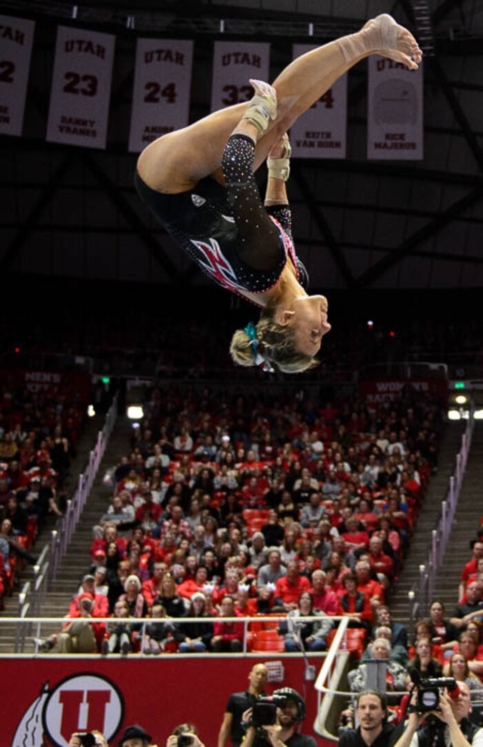 (Trent Nelson | The Salt Lake Tribune)  Tiffani Lewis on floor as Utah hosts Washington, NCAA gymnastics in Salt Lake City, Saturday February 3, 2018.