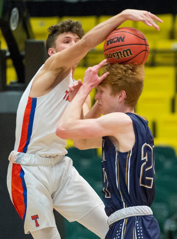 (Rick Egan | The Salt Lake Tribune) Timpview Thunderbirds Rowan Reay (2) is called for a would as he steals the ball form Skyline Eagles Andrew Clark (24) in the final seconds of the game, in 5A basketball playoff action between the Timpview Thunderbirds and at the Skyline Eagles, at the UCCU Center in Orem, Monday, Feb. 26, 2018.