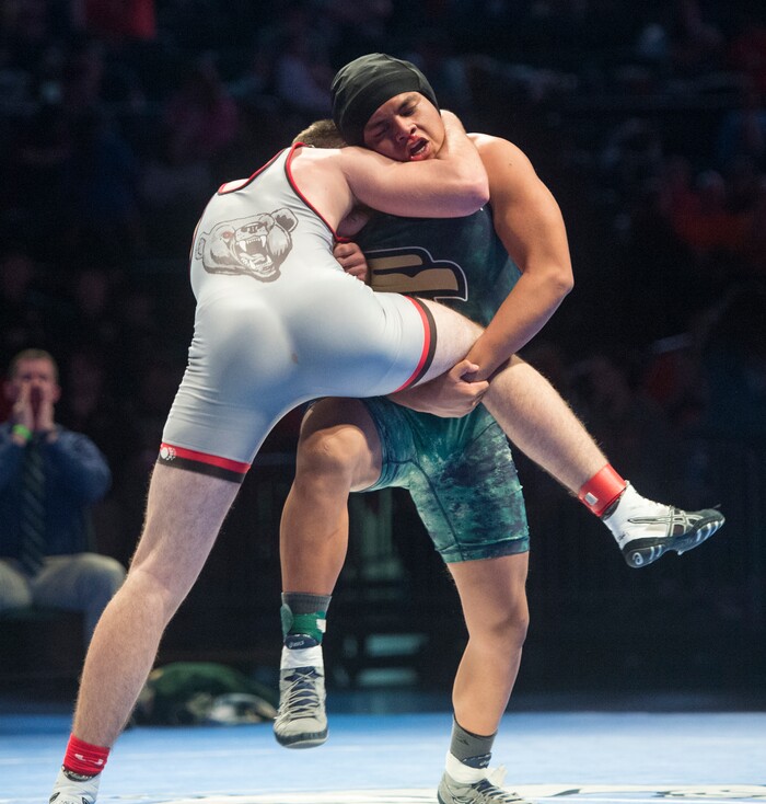 (Rick Egan  |  The Salt Lake Tribune)   Logan Pond (Bear River) wrestlesTuiits Kanosh (Snow Canyon).  Pond own the match (Dec 5-2) in the 4A State Wrestling at UVU in Orem, Saturday, February 10, 2018.