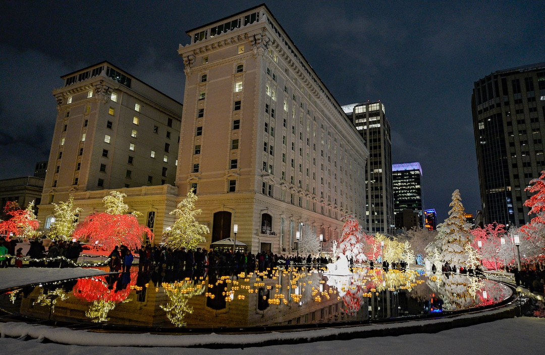 (Francisco Kjolseth  |  The Salt Lake Tribune)  Visitors take in the sights as Temple Square in Salt Lake City comes to life Friday, November 29, 2019, as hundreds of thousands of colorful LED bulbs light up, a yearly tradition that started in 1965. The lights will run through the end of the year.