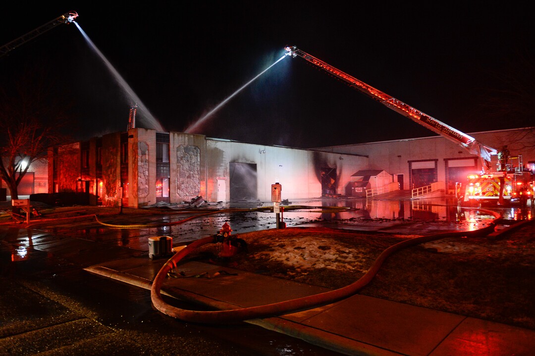 (Francisco Kjolseth  |  The Salt Lake Tribune)  Crews from multiple agencies battled a fire Sunday night that broke out at South Valley Specialties at 9320 S. 547 West in Sandy. The building, where the company makes custom rubber moldings and other products, was declared a complete loss. The cause of the blaze is under investigation.
