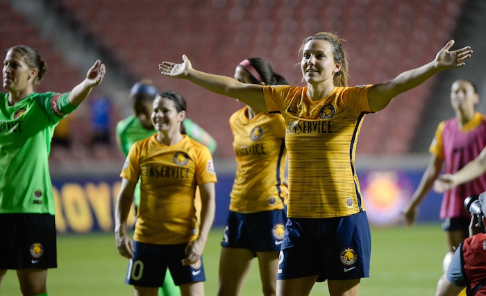 (Francisco Kjolseth  |  The Salt Lake Tribune)  Utah Royals FC hosts Washington Spirit, NWSL soccer at Rio Tinto Stadium in Sandy, Wed. Aug. 8, 2018. The Royals clap along with the fans after their 1-0 win. 