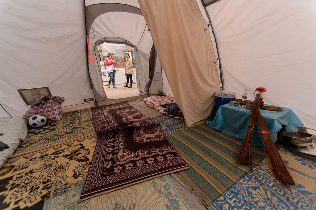 (Trent Nelson | The Salt Lake Tribune)  Heather Baniulis, left, gives a tour of a tent, at Doctors Without Borders' exhibit Forced From Home at the Salt Lake City Main Library, Tuesday September 19, 2017. The free interactive exhibition designed to expose the realities of the global refugee crisis.