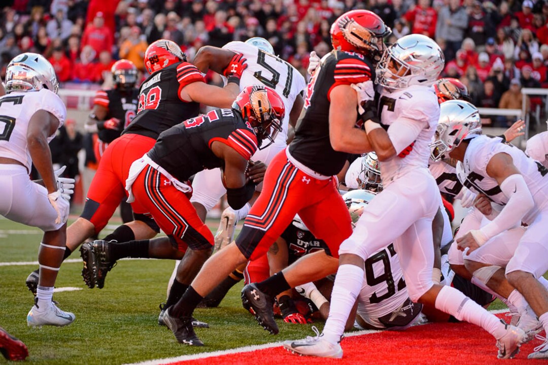 (Trent Nelson | The Salt Lake Tribune)  Utah Utes quarterback Jason Shelley (15) runs for a touchdown. Utah Utes host the Oregon Ducks, NCAA football at Rice-Eccles Stadium in Salt Lake City on Saturday Nov. 10, 2018.