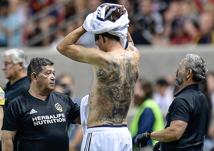 (Francisco Kjolseth  |  The Salt Lake Tribune)  Los Angeles Galaxy forward Zlatan Ibrahimovic (9) gets a new shirt and medical treatment to his head during the second half of the MLS soccer match Saturday, Sept. 1, 2018, in Sandy at Rio Tinto Stadium against RSL.