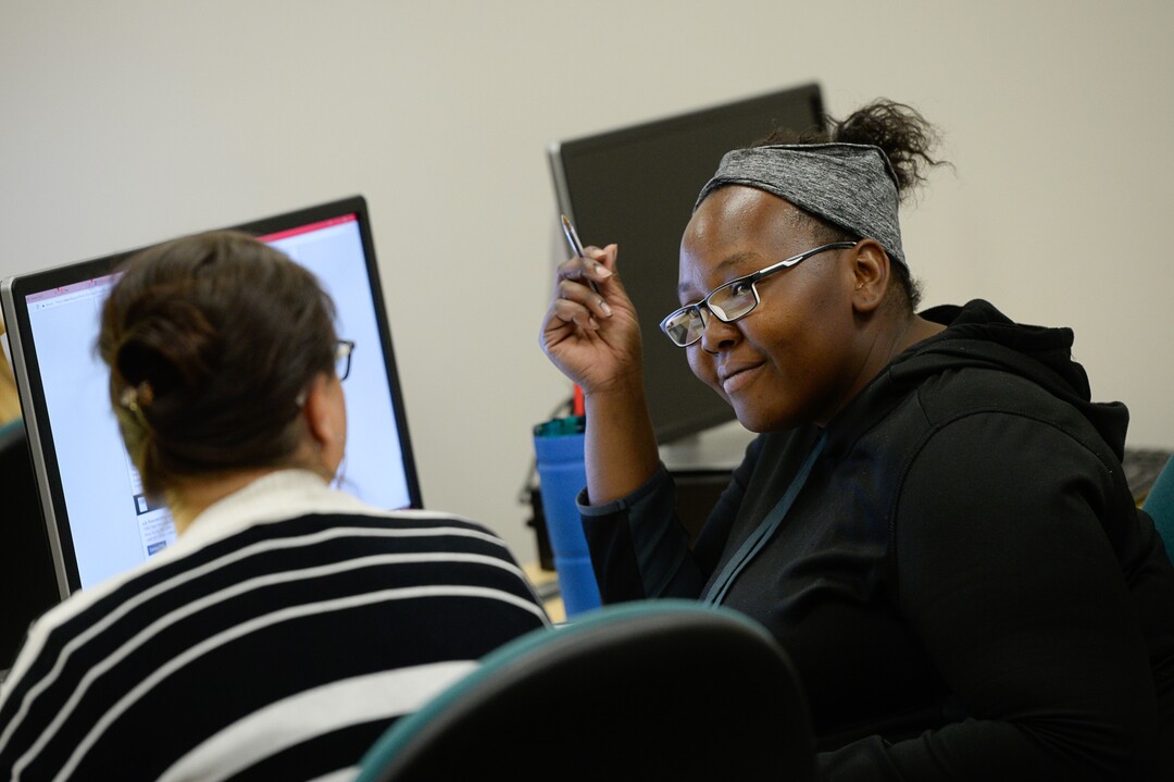(Francisco Kjolseth  |  The Salt Lake Tribune)  Deidre Bess speaks with a fellow student as single mothers participate in the Invest in You Too program, a 13-week course that helps single mothers build skills in medical manufacturing and job readiness to open the doors for employment.