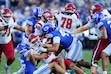 (Francisco Kjolseth | The Salt Lake Tribune) Utah Tech Trailblazers running back Kona Crowell (22) feels the weight of the BYU defense during the first half of an NCAA college football game against Utah Tech, Saturday, Sept. 5, 2026, at LaVell Edwards Stadium in Provo.