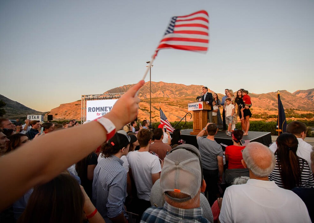 (Trent Nelson | The Salt Lake Tribune)Surrounded by family, Mitt Romney speaks in Orem after winning the Republican primary for U.S. Senate, Tuesday June 26, 2018.