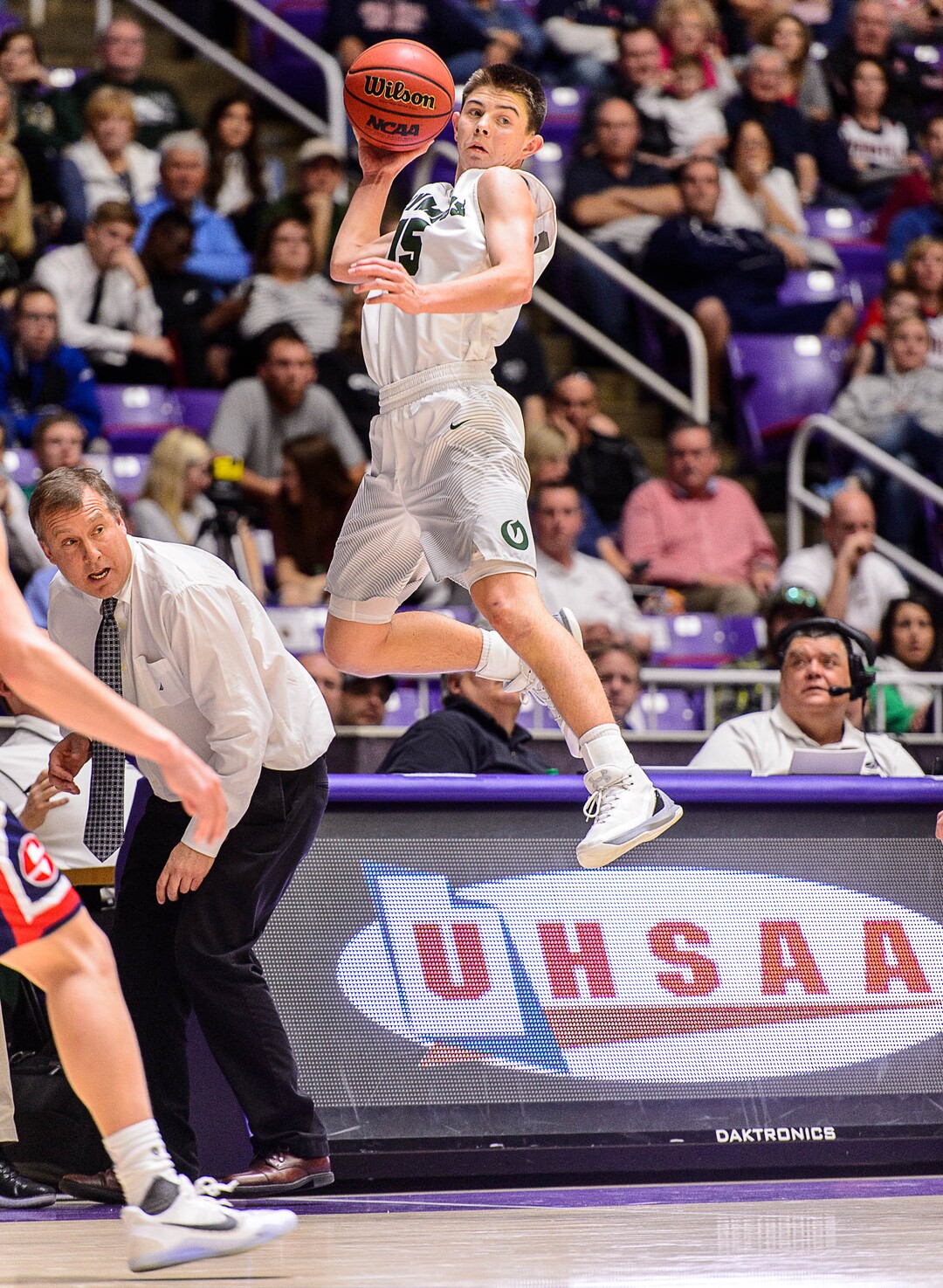 Trent Nelson  |  The Salt Lake TribuneOlympus's Rylan Jones (15) leaps to recover the ball as it goes out of bounds as Springville faces Olympus in the 4A state high school basketball championship game, Saturday March 4, 2017.