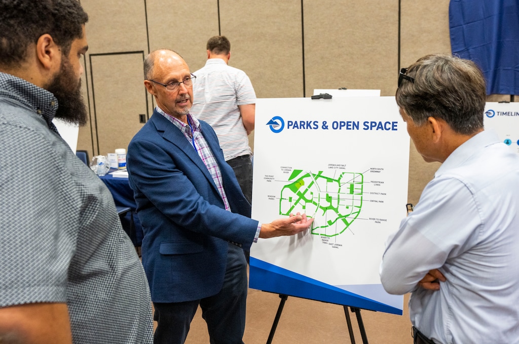(Rick Egan | The Salt Lake Tribune) Jim McRae talks to concerned citizens Thursday about plans for The Point, a development project that will be built on the prison site in Draper.