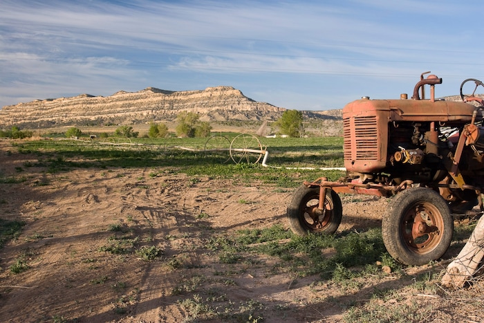 (Greg Willis | Courtesy Wikimedia Commons) The Straight Cliffs loom above the the southern Utah town Escalante is pictured December, 2013.