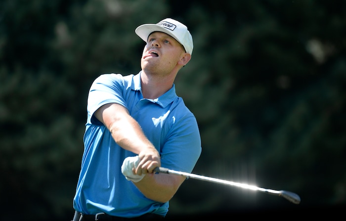 (Scott Sommerdorf | The Salt Lake Tribune)
Patrick Fishburn gives his tee shot on 17 a little body english on his way to winning the Utah Open golf tournament played at the Riverside Country Club, Sunday, August 27, 2017. Fishburn crushed the field, winning by nine shots.