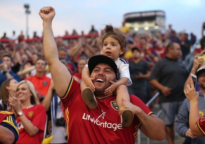 Real Salt Lake fans reacts after the team scored against Manchester United during the first half of a friendly soccer match Monday, July 17, 2017, in Sandy, Utah. (AP Photo/Rick Bowmer)