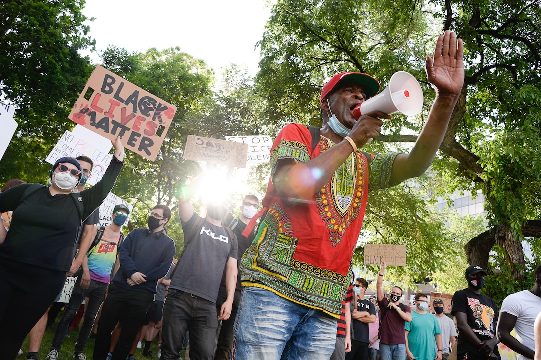 (Francisco Kjolseth  |  The Salt Lake Tribune) Hasson Davis  joins demonstrators protesting against police brutality on Tuesday, June 2, 2020, in downtown Salt Lake City, as an 8 p.m. weeklong curfew remains in order.