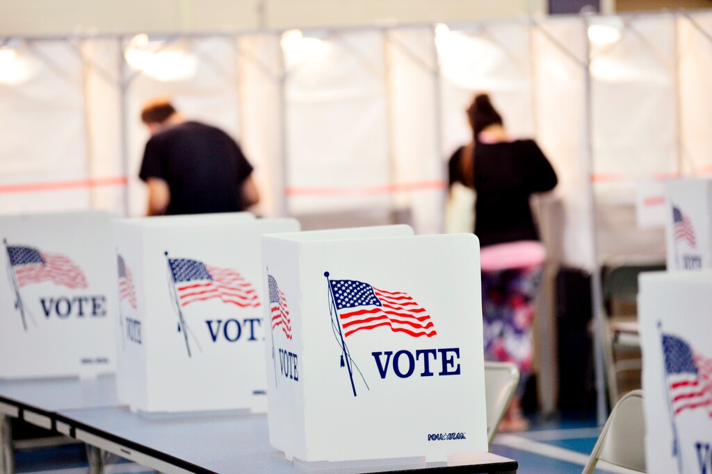 (Kristopher Radder | The Brattleboro Reformer via AP file photo)  Voting booths are kept socially distant at the Chesterfield, N.H., polling site on Sept. 8, 2020.