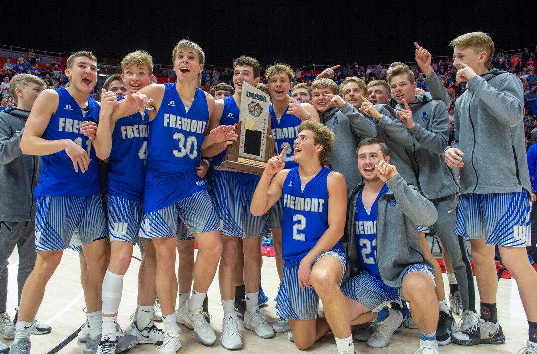 (Rick Egan  |  The Salt Lake Tribune)    The Fremont Silverwolves celebrate their win 55-52 win over the Davis Darts, in the 6A basketball championship game at the Jon M. Huntsman Center, Saturday Feb. 29, 2020