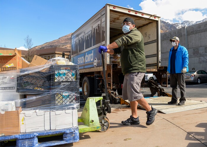 (Leah Hogsten  |  The Salt Lake Tribune)  Snowbird employees handed out over 10,000 pounds of perishable items from the ski resort's restaurants and stores to their workforce, March 21, 2020. The food included milk, eggs, bread, cheeses, every kind of herb, vegetable and fruit, including kumquats and lemon grass, and was given to Snowbird employees on a first-come, first-served basis.