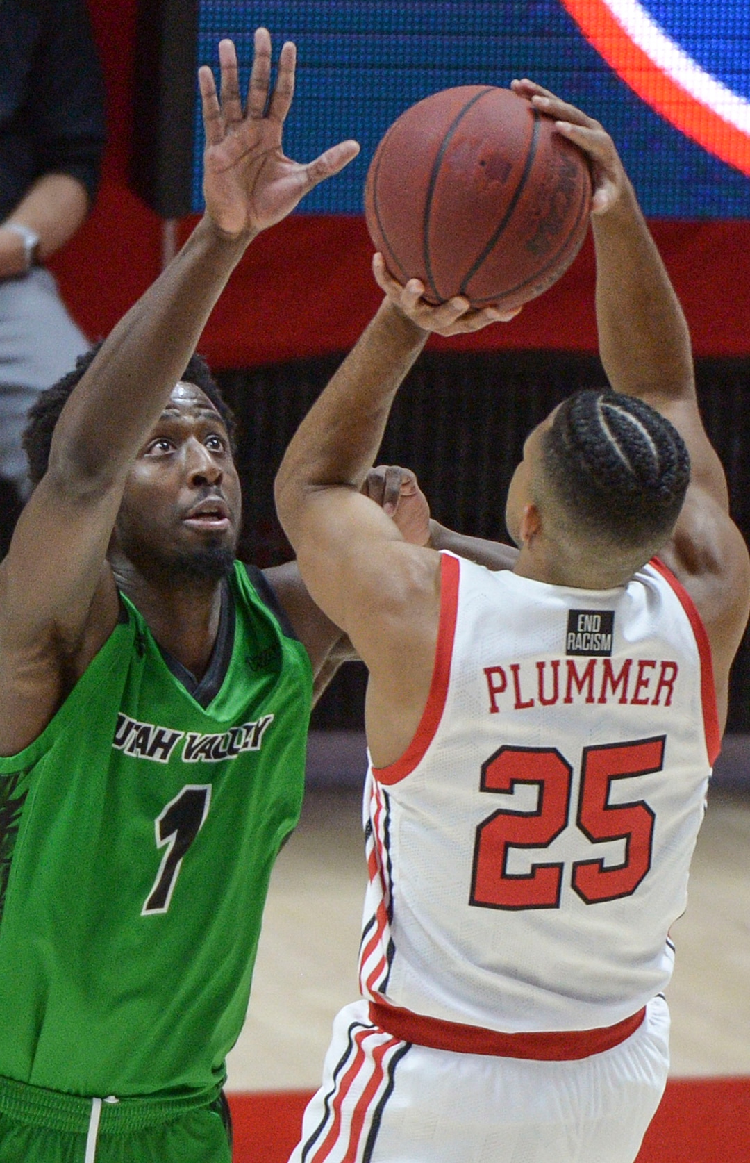 (Leah Hogsten  |  The Salt Lake Tribune) Utah Valley Wolverines guard Le'Tre Darthard (1)pressures Utah Utes guard Alfonso Plummer (25) as the Utes host Utah Valley University on Tuesday, Dec. 15, 2020 at the Jon M. Huntsman Center.