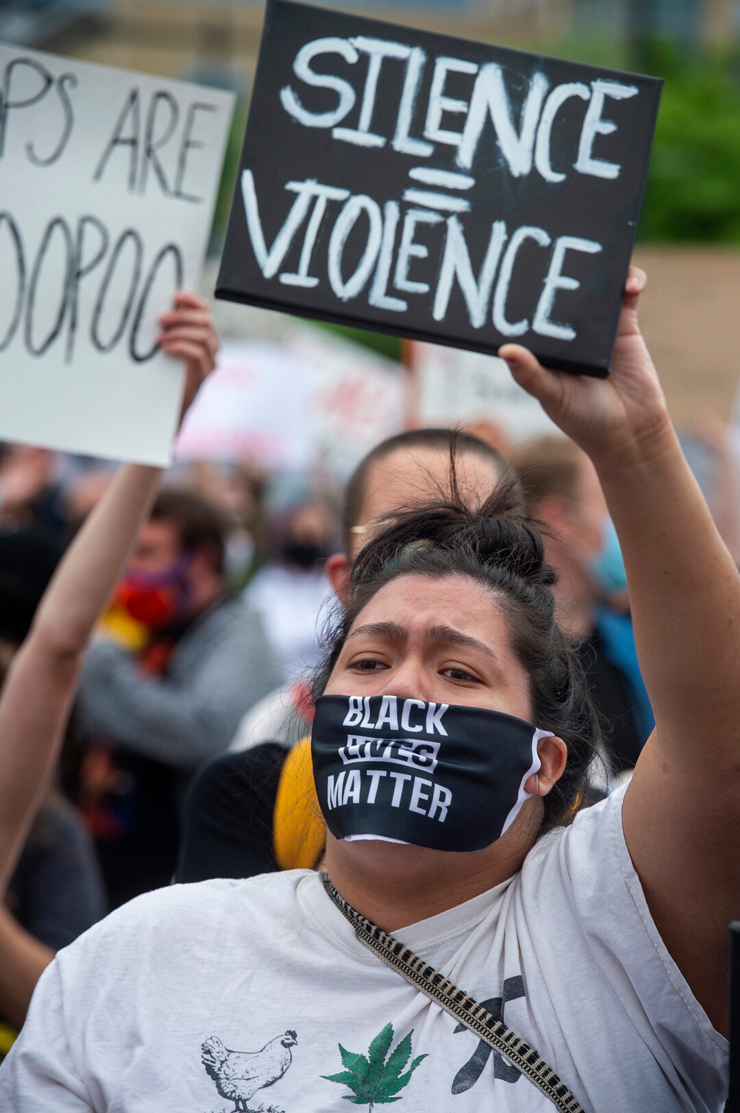 (Rick Egan  |  The Salt Lake Tribune) Demonstrators march down State Street in Salt Lake City on Saturday, June 13, 2020.