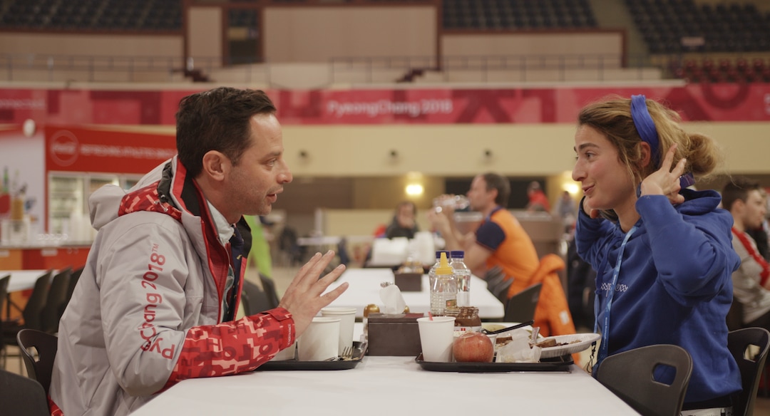 (Photo courtesy of IFC Films) Nick Kroll, left, plays Ezra, a volunteer dentist at the PyeongChang games, and Alexi Pappas, plays Penelope, an Olympic cross-country skier, in the romantic comedy "Olympic Dreams," filmed on location at the 2018 Winter Olympics. It opens Friday, Feb. 21, 2020, at the Broadway Centre Cinemas in Salt Lake City.