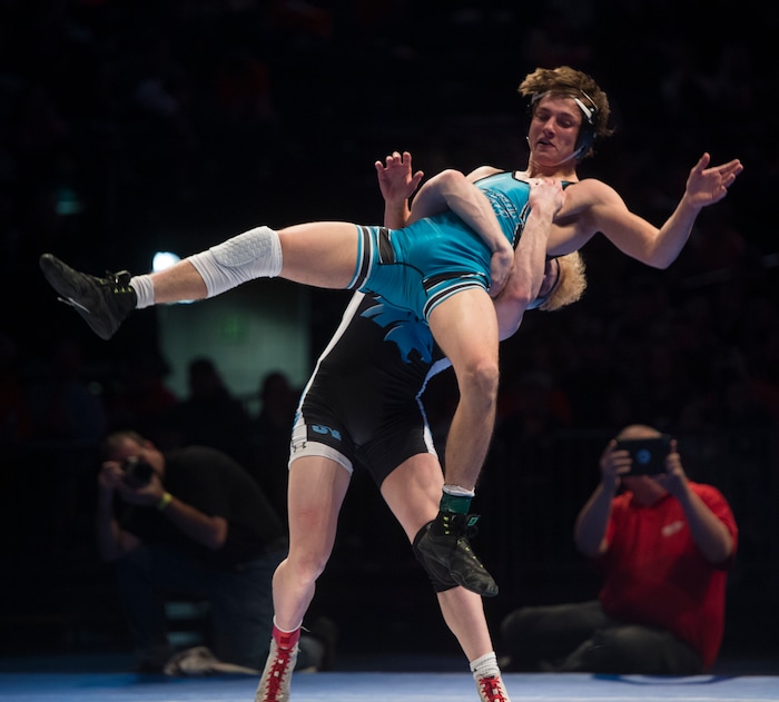 (Rick Egan  |  The Salt Lake Tribune)   Ryan Hansen (Sky View) defeats Brady Lowry (Canyon View) (Dec 8-5) in the 145 weight class, in the 4A State Wrestling at UVU in Orem, Saturday, February 10, 2018.