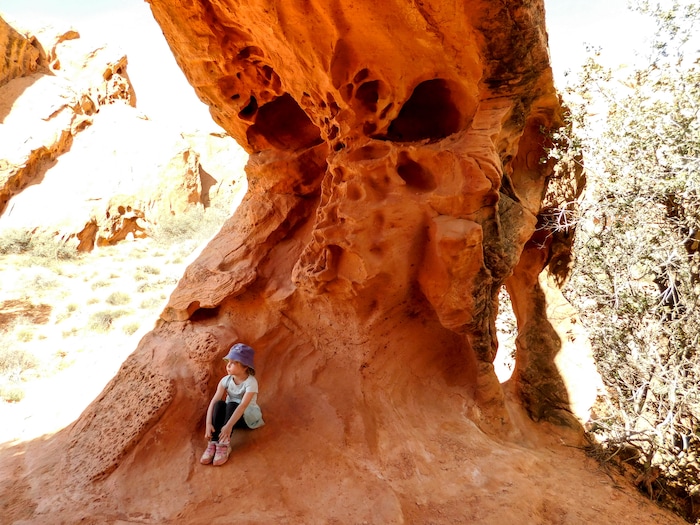 The Salt Lake Tribune|Erin Alberty
A hiker rests in the shade of Babylon Arch on March 12, 2017 in the Red Cliffs Desert Reserve near Leeds.
