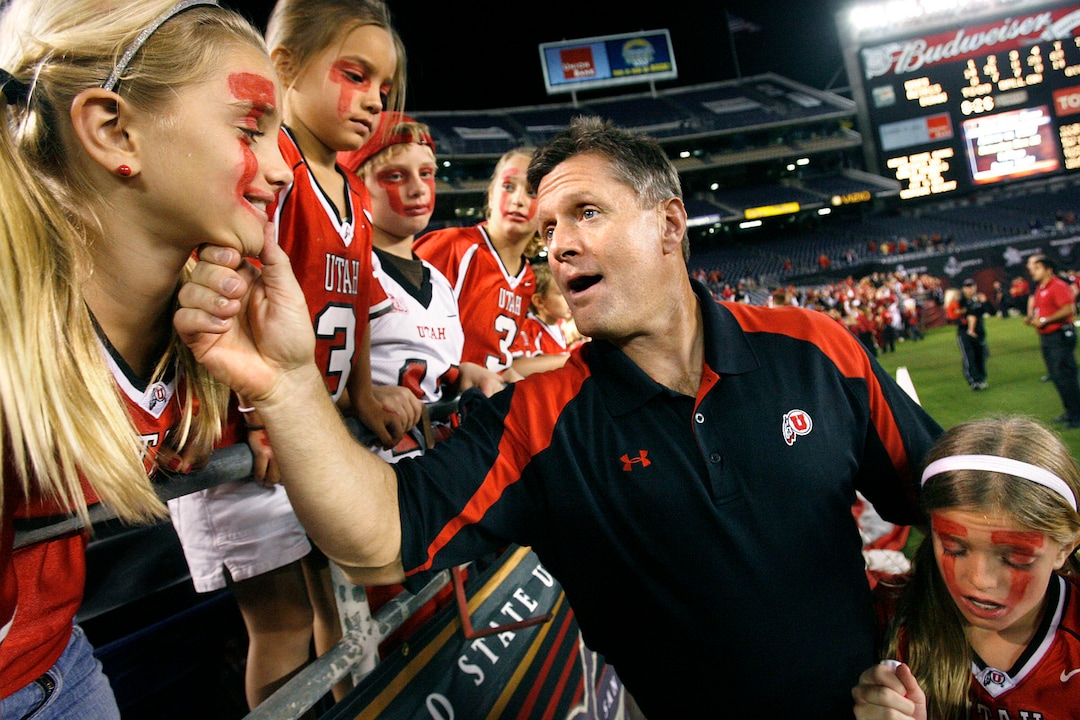 THE WHITTINGHAMSUtah head coach Kyle Whittingham playfully pinches the chin of one of his nieces as she was asking him if they could jump onto the field after Utah defeated San Diego State 63-14.Scott Sommerdorf / The Salt Lake Tribune