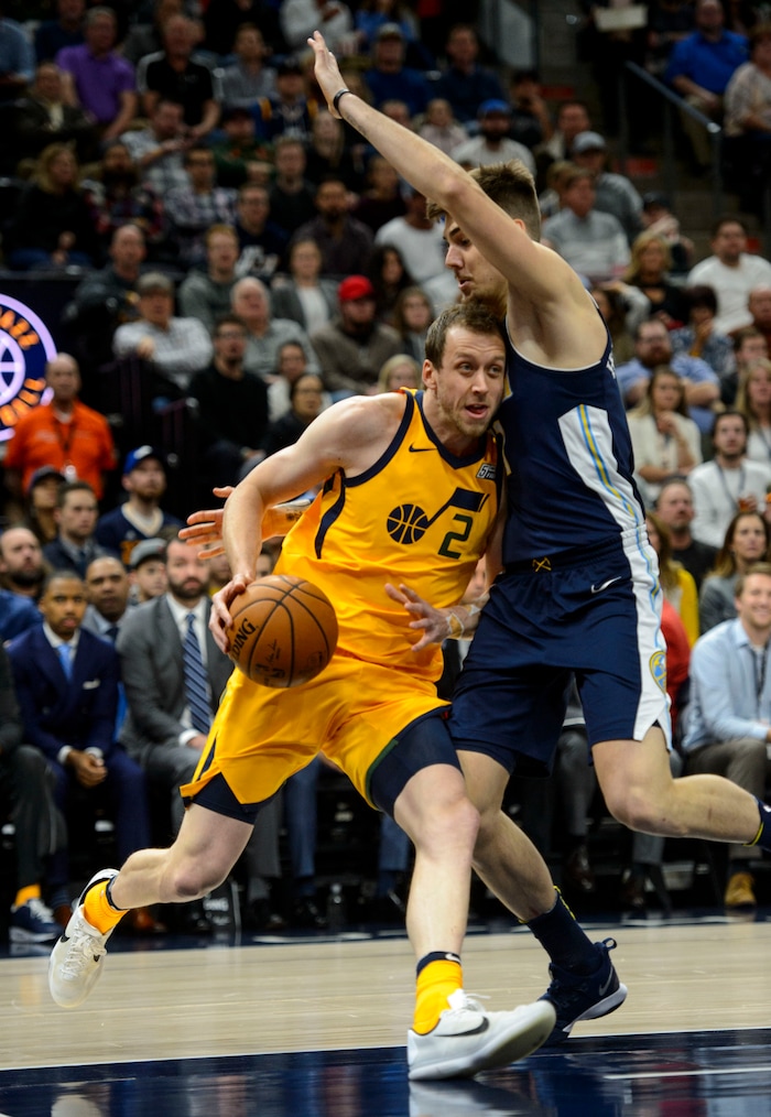 (Steve Griffin  |  The Salt Lake Tribune) Utah Jazz forward Joe Ingles (2) drives into Denver Nuggets forward Juan Hernangomez (41)during the Utah Jazz versus Denver Nuggets NBA basketball game at Vivint Smart Home Arena  in Salt Lake City Tuesday November 28, 2017.