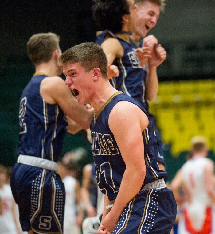 (Rick Egan | The Salt Lake Tribune) The Skyline Eagles celebrate their 67-63 win over Timpview, in 5A basketball playoff action between the Timpview Thunderbirds and at the Skyline Eagles, at the UCCU Center in Orem, Monday, Feb. 26, 2018.