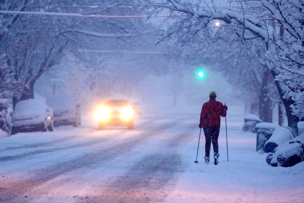 (Francisco Kjolseth | The Salt Lake Tribune) A skier makes his way to Sugar House Park as snow blankets the Salt Lake Valley on Wednesday, Feb. 22, 2023.