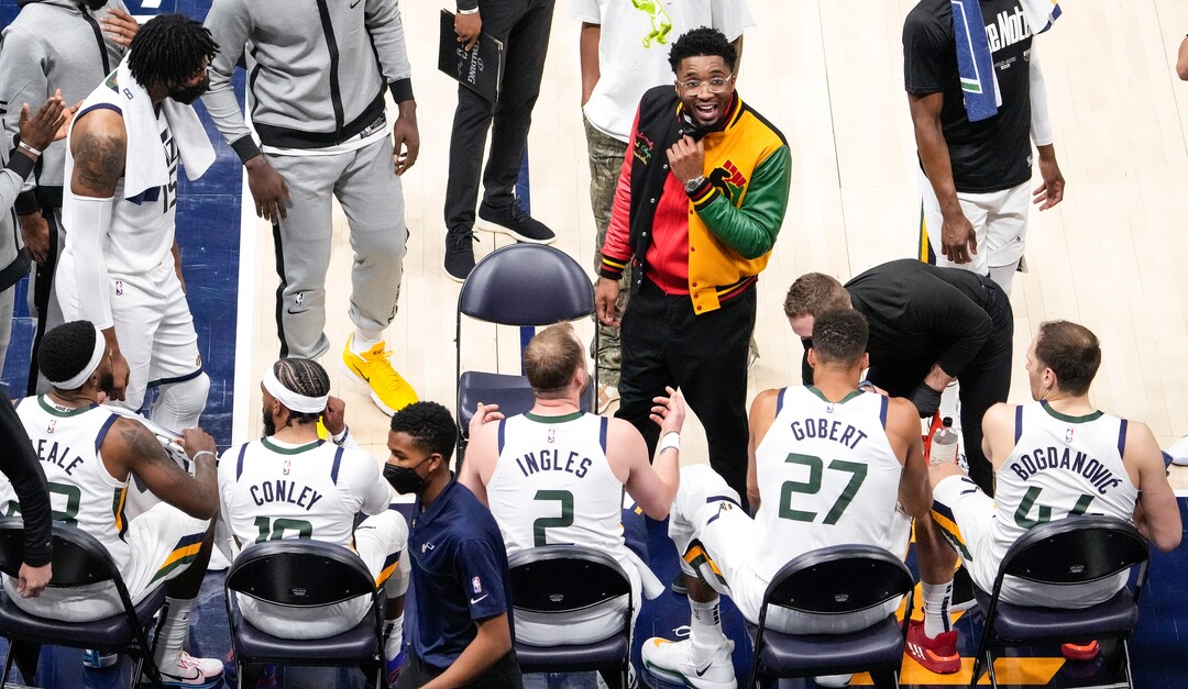 (Leah Hogsten | The Salt Lake Tribune) Utah Jazz guard Donovan Mitchell (45) talks strategy with the team during a timeout as the Utah Jazz take on the Memphis Grizzlies during Game 1 of the first-round playoffs at Vivint Arena, May 23, 2021.