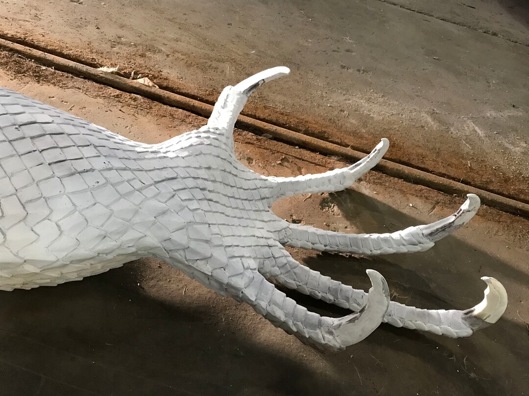 (Courtesy Red Iguana) An arm during the early stages of forming the iguana sculpture.