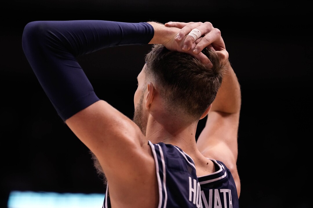 (Francisco Kjolseth | The Salt Lake Tribune) Utah State Aggies forward Brandon Horvath (4) shows frustration with a call in basketball action between the Brigham Young Cougars and the Utah State Aggies at the Marriott Center in Provo, Wednesday, Dec. 8, 2021.