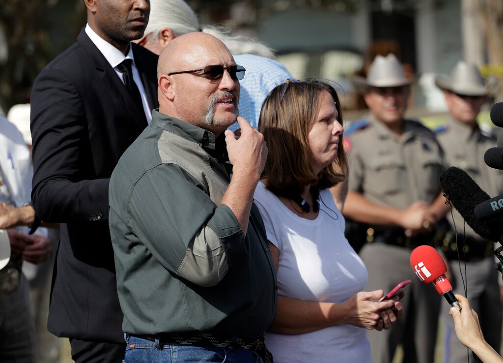 Pastor Frank Pomeroy and his wife Sherri join a news conference near the First Baptist Church of Sutherland Springs, Monday, Nov. 6, 2017, in Sutherland Springs, Texas. A man opened fire inside the church in the small South Texas community on Sunday, killing and wounding many. The Pomeroy's daughter, Annabelle, 14, was killed in the shooting. (AP Photo/Eric Gay)