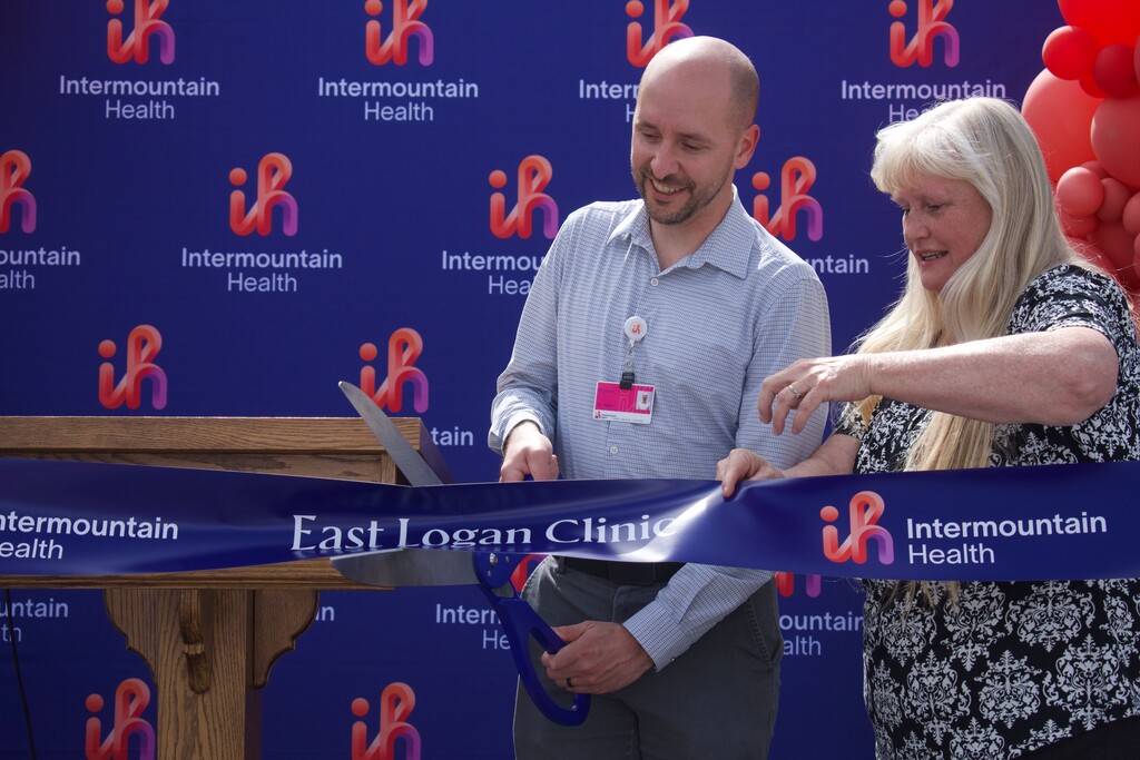 (Clarissa Casper | The Salt Lake Tribune) Dr. Ryan Allen cuts the ribbon on Tuesday, June 3, officially opening Intermountain Health’s new East Clinic at Logan Regional Hospital. The clinic will help improve primary care access for Cache Valley’s growing population.