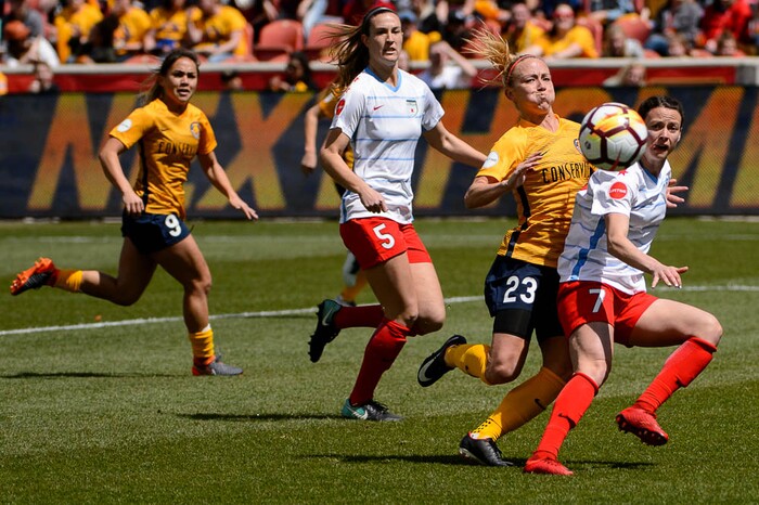 (Trent Nelson | The Salt Lake Tribune)  
Utah Royals FC hosts the Chicago Red Stars, at Rio Tinto Stadium in Sandy, Saturday April 14, 2018. Utah Royals FC midfielder Gunnhildur Jónsdóttir (23) defended by Chicago Red Stars midfielder Taylor Comeau (7).