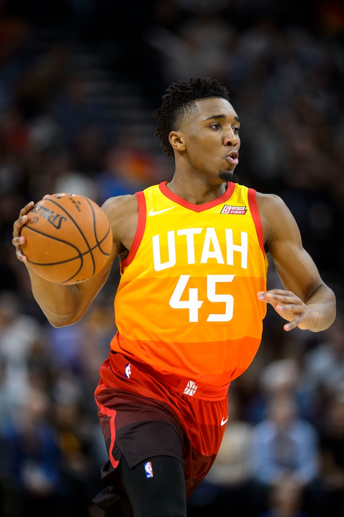 (Steve Griffin  |  The Salt Lake Tribune) Utah Jazz guard Donovan Mitchell (45) drives to the basket during the Utah Jazz versus Golden State Warriors at Vivint Smart Home Arena in Salt Lake City Tuesday January 30, 2018.