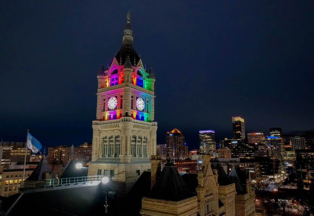 (Francisco Kjolseth | The Salt Lake Tribune) City Hall is lit up with pride colors on Saturday, March 15, 2025. Salt Lake City Mayor Erin Mendenhall flew the pride flag outside and lit the tower to show opposition to HB77, which would ban pride flags in Utah schools and public buildings.