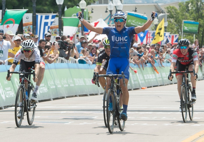 (Rick Egan  |  The Salt Lake Tribune)  Travis McCabe celebrates at the finish line,  as he finishes first in stage 5, in the Tour of Utah, in Bountiful,Friday, August 4, 2017.


