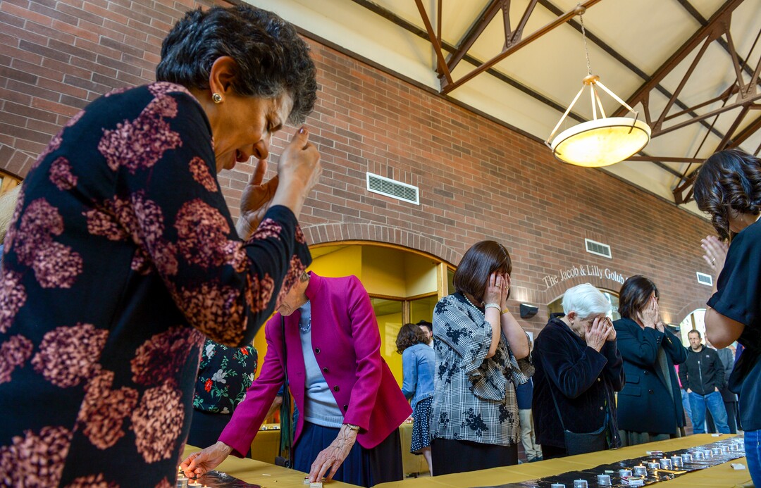 Leah Hogsten  |  The Salt Lake Tribune l-r Representative Patrice Arent, Pamela Atkinson, Sharonne Zippel, Hilda Isaacson and Joan Kottler say prayers during the Shabbat candle lighting. Jewish women in Utah at the Chabad Lubavitch of Utah and the world over kindled Shabbat candles, May 3, 2019 in loving tribute to Lori Gilbert-Kaye and in prayer for peace and tolerance amongst all of humanity. Lori Kaye was killed during The Chabad of Poway synagogue shooting on the last day of Passover and three others were injured. Although the lighting of Shabbat Candles is uniquely tasked to the Jewish woman, the  community and those wishing to show their support were welcome to attend.