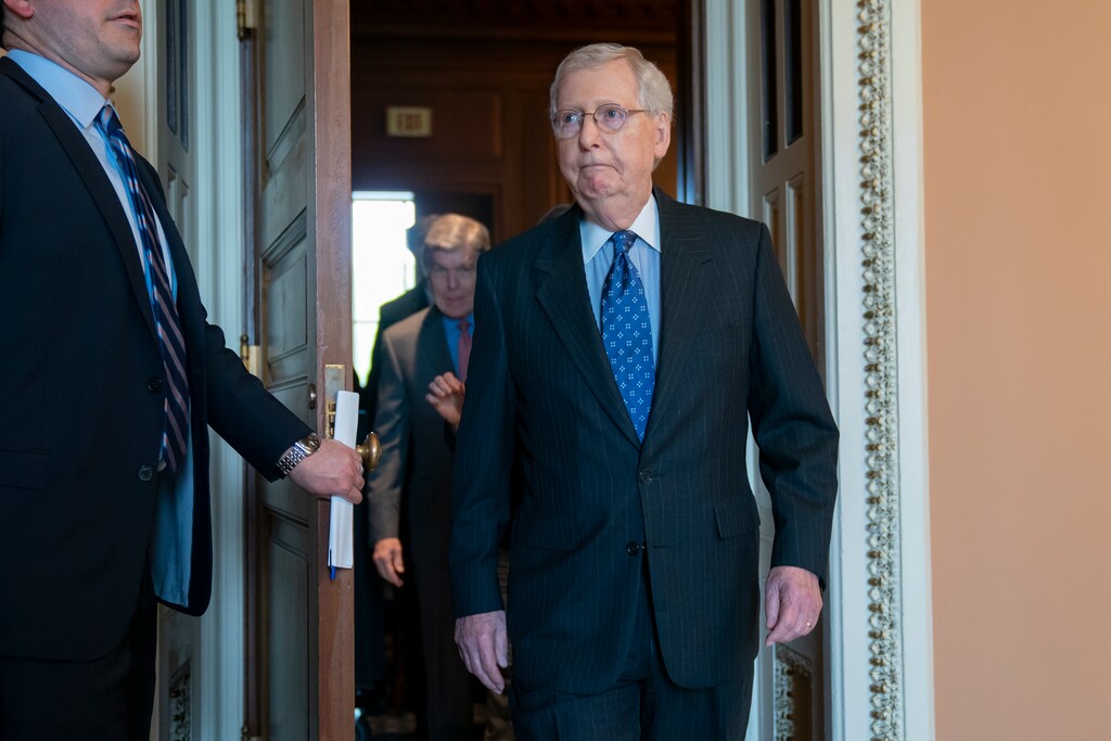 Senate Majority Leader Mitch McConnell, R-Ky., exits a closed-door meeting with the Republican Conference to speaks to reporters at the Capitol in Washington, Tuesday, April 30, 2019. (AP Photo/J. Scott Applewhite)