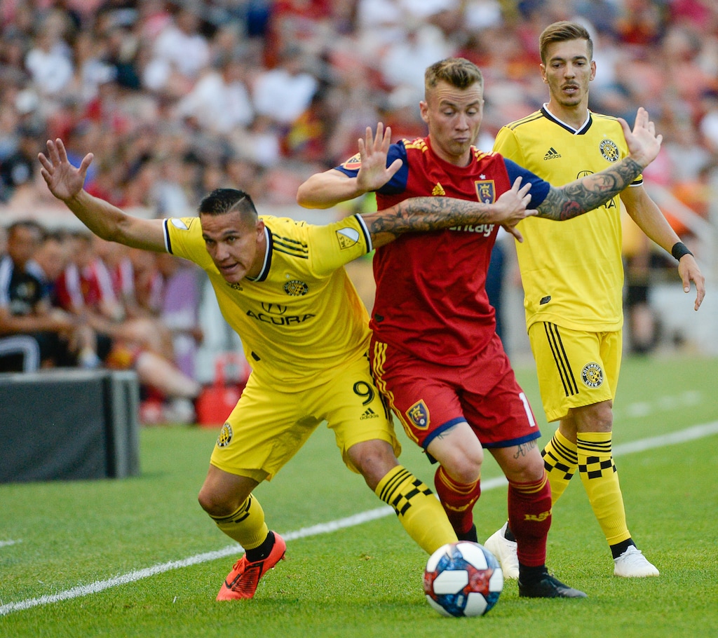 (Francisco Kjolseth  |  The Salt Lake Tribune)  Columbus Crew midfielder David Guzman (9) battles Real Salt Lake midfielder Albert Rusnak (11) as Real Salt Lake hosts Columbus Crew SC, in MLS Soccer at Rio Tinto Stadium in Sandy, Utah on Wed, July 3, 2019.